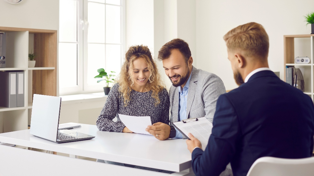 happy couple is visiting lawye